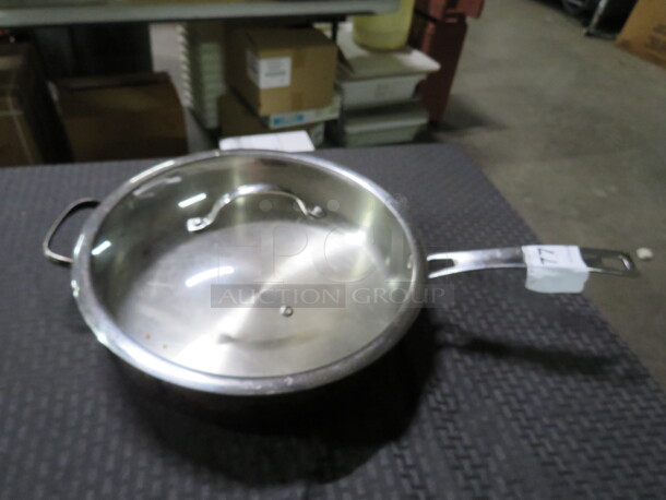 One 13 Inch Skillet With Lid.