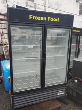 True 2 Door Merchandiser Freezer 
Good Working Condition
Not On Casters
