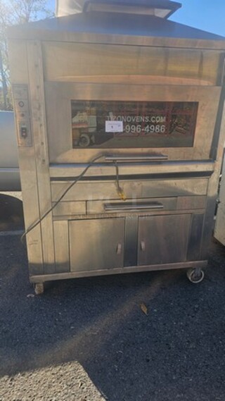 Very Nice Tizon Ovens Charcoal Rotisserie Oven.