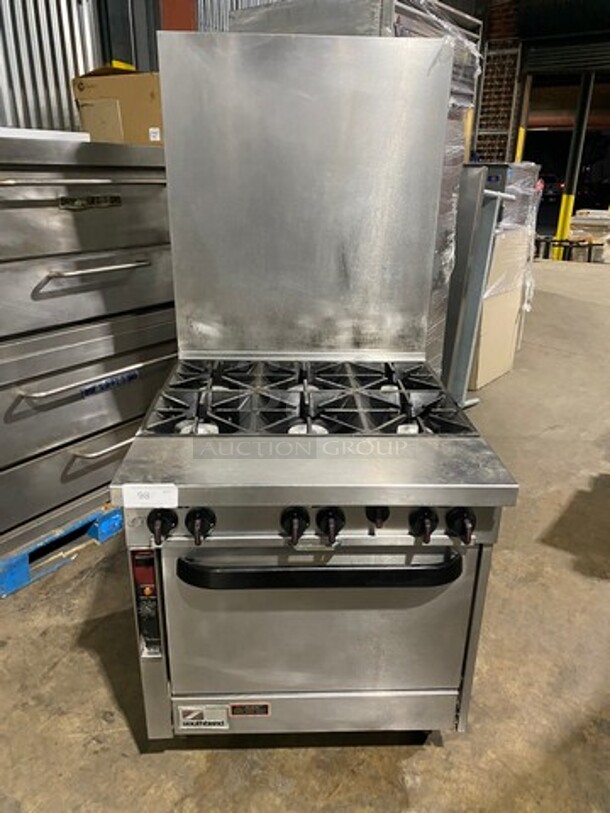 Southbend Commercial Natural Gas Powered 6 Burner Stove! With Raised Back Splash! With Oven Underneath! All Stainless Steel! On Casters!