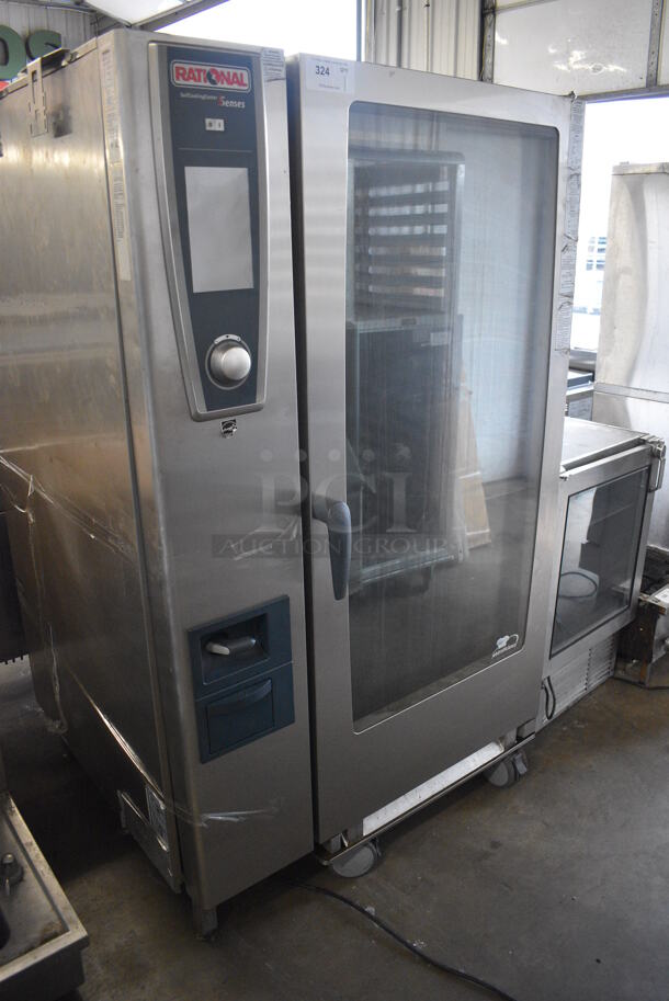 2016 Rational Model SCC WE 202G Stainless Steel Commercial Natural Gas Powered Combitherm Convection Oven w/ Rack on Commercial Casters. 340,000 BTU. 42x40x70