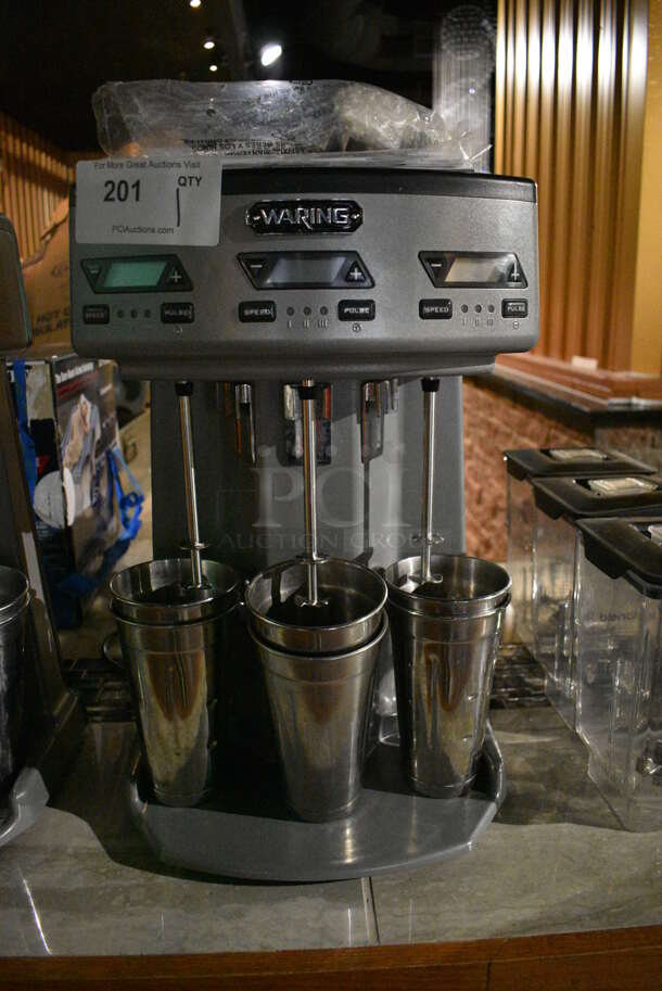Waring WDM360TX Metal Commercial Countertop 3 Head Drink Mixer w/ 6 Metal Mixing Cups. 120 Volts, 1 Phase. 13x10.5x20. Item Was in Working Condition on Last Day of Business. (bar)