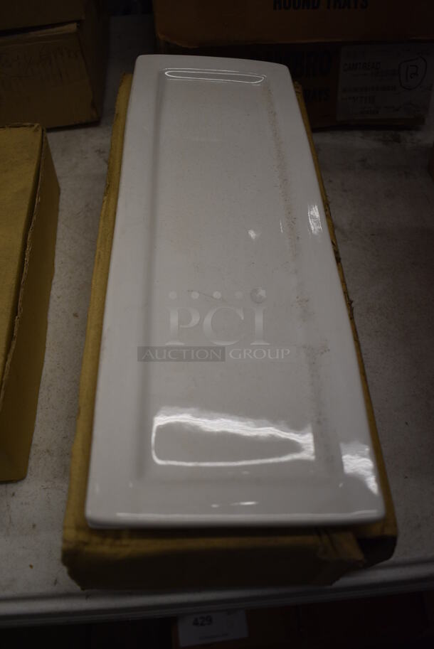 4 BRAND NEW IN BOX! White Ceramic Rectangular Plates. 16x5.5x1. 4 Times Your Bid!