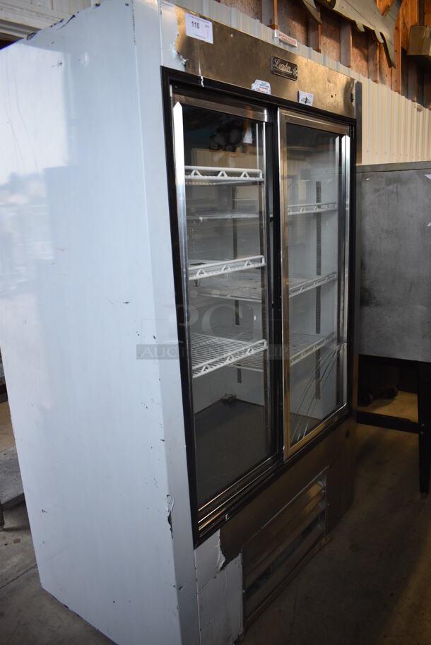 2016 Leader Model LS48 SC Stainless Steel Commercial 2 Door Reach In Cooler Merchandiser w/ Poly Coated Racks. See Pictures For Damage To Glass. 115 Volts, 1 Phase. 48x30x75. Tested and Powers On But Does Not Get Cold