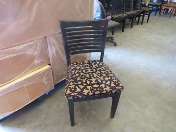Wooden Chair Painted Black With A Cushioned Seat. 2XBID