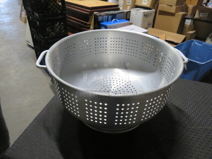 One 16 Inch Aluminum Colander.