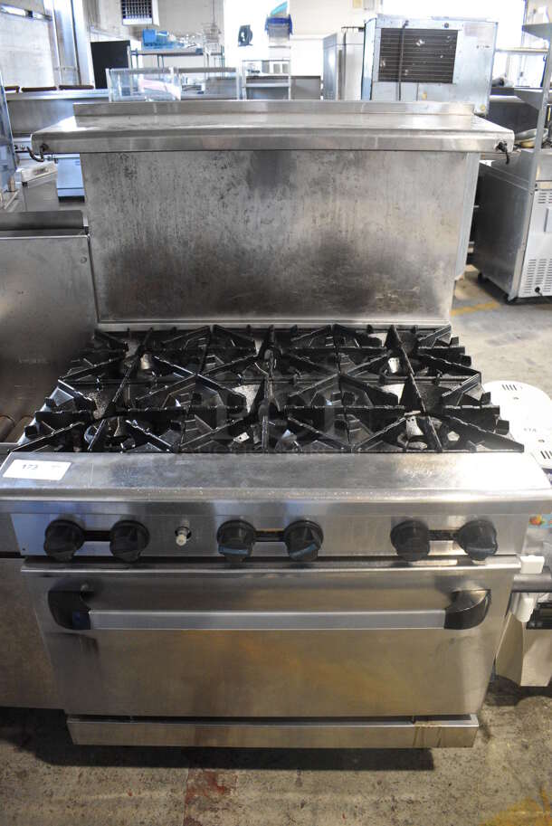 Stainless Steel Commercial Natural Gas Powered 6 Burner Range w/ Oven, Over Shelf and Back Splash. 36x32x57