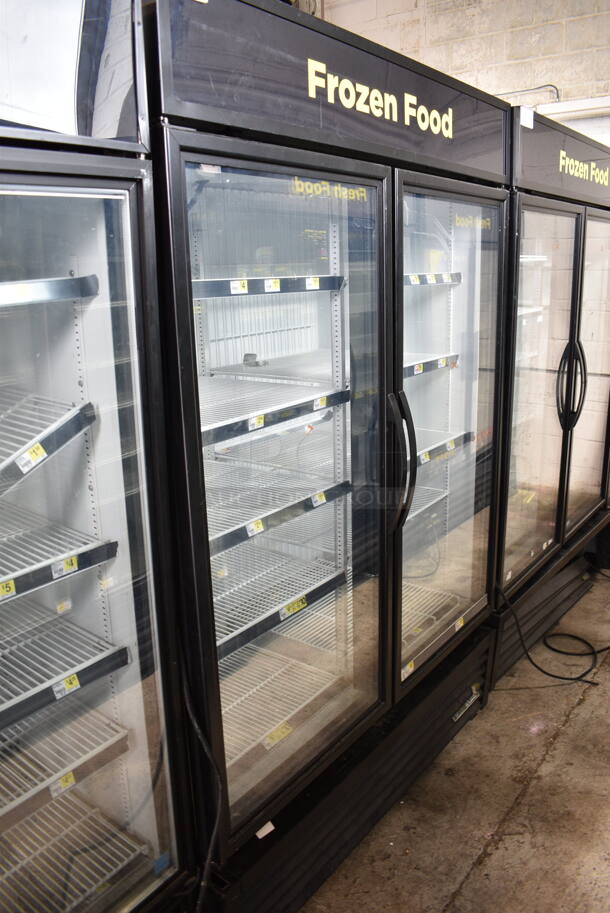 2018 True GDM-49F-HC ENERGY STAR Metal Commercial 2 Door Reach In Freezer Merchandiser w/ Poly Coated Racks. 115/208-230 Volts, 1 Phase. Tested and Working!