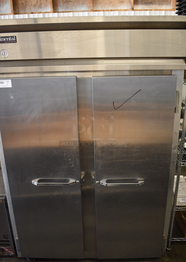 Continental Model 2R Stainless Steel Commercial 2 Door Reach In Cooler on Commercial Casters. 115 Volts, 1 Phase. 52x36x82. Tested and Powers On But Does Not Get Cold