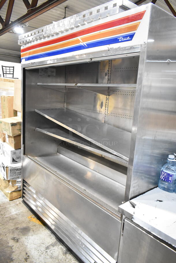 2015 True TAC-72-LD Stainless Steel Commercial Open Grab N Go Merchandiser w/ Metal Shelves. 115 Volts, 1 Phase. Tested and Powers On But Does Not Get Cold