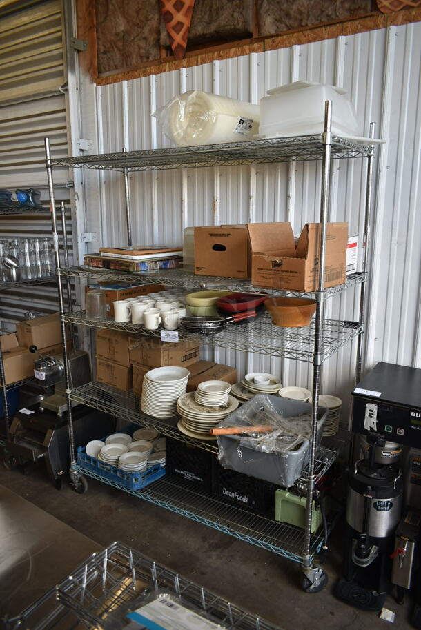 ALL ONE MONEY! Lot of Items on Shelving Unit Including Mugs, Dishes and Utensils. Does Not Include Shelving Unit