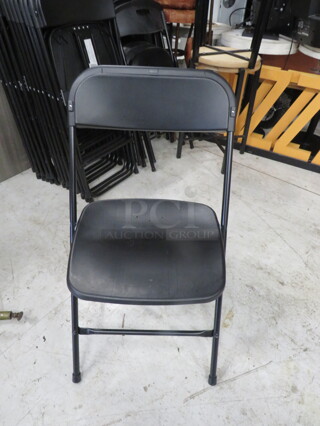 Black Poly Folding Chair. 4XBID