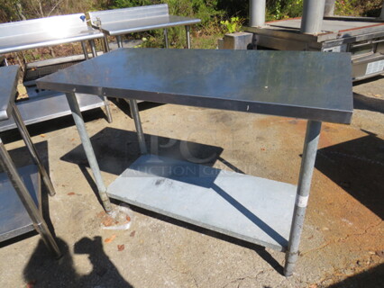 One Stainless Steel Table With A SS Under Shelf. 49X24X35