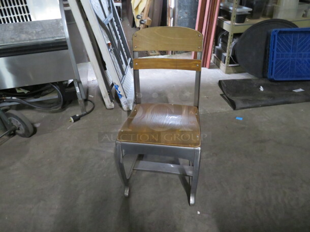 One Wooden Metal Vintage Look Chair.