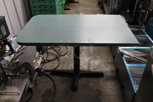 Dining Height Table on Black Metal Table Base.