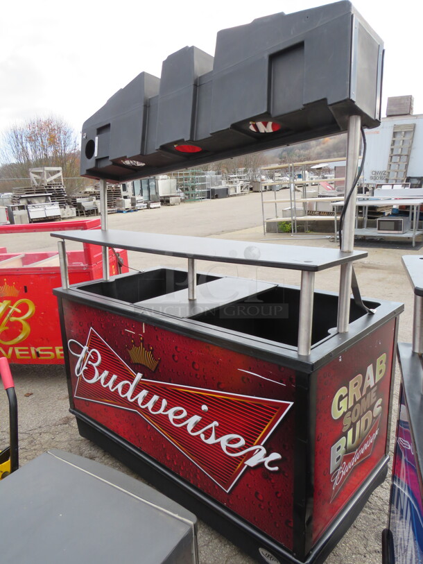 One Budweiser IRP Elite Beverage Cart/Kiosk With 2 Wells, Under Shelf, And Over Shelf On Casters.  62X30.5X78 