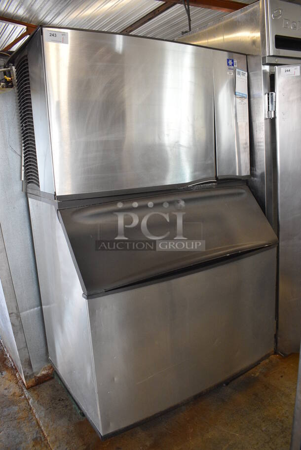 Manitowoc Model SD1602A Stainless Steel Commercial Ice Machine Head on Commercial Ice Bin. 208-230 Volts, 1 Phase. 48x33x80