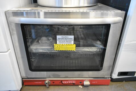 BRAND NEW SCRATCH AND DENT! Avantco 177CO28M Stainless Steel Commercial Countertop Electric Powered Half Size Convection Oven. 208/240 Volts, 1 Phase. 