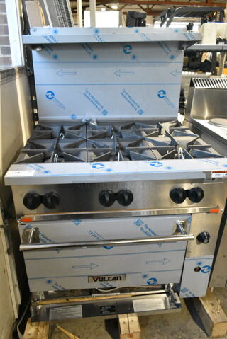 BRAND NEW SCRATCH AND DENT! Vulcan 36S-6BN Stainless Steel Commercial Floor Style Natural Gas Powered Range w/ Oven, Over Shelf and Back Splash. 215,000 BTU