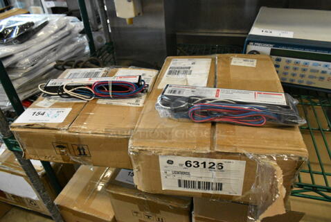 2 Boxes of Various Ballasts Including General Electric 63126 and General Electric 38970. 2 Times Your Bid! 