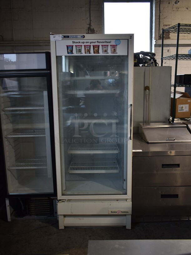 National ULG30BSP-5 Metal Commercial Single Door Reach In Freezer Merchandiser w/ Poly Coated Racks. 115 Volts, 1 Phase. Tested and Powers On But Does Not Get Cold