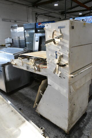 Metal Commercial Floor Style Dough Sheeter on Commercial Casters. Cannot Test Due To Cut Power Cord