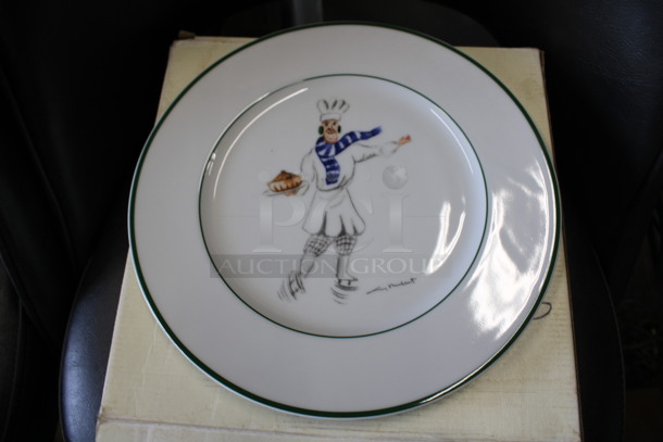 4 BRAND NEW IN BOX! White Ceramic Plates w/ Chef Phillipe on Ice Skates Serving Soup. 11x11x1. 4 Times Your Bid!