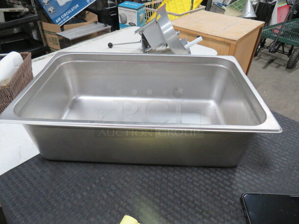 One Full Size 6 Inch Deep Hotel Pan.