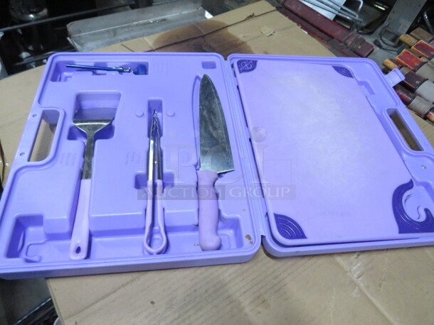 One San Jamar Carry Case With Cutting Board, Spatula, Chef Knife, Tongs And Thermometer. 
