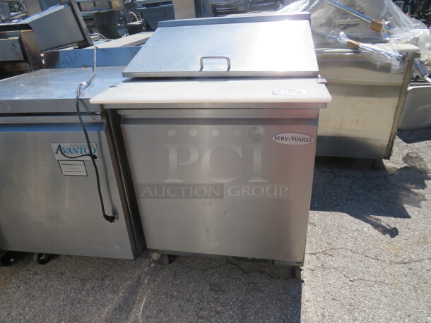 One Serv Ware 1 Door Refrigerated Prep Table With 1 Rack On Casters. Working NOT Cold. Model# SP29-12M. 115 Volt. 29X34X44. 