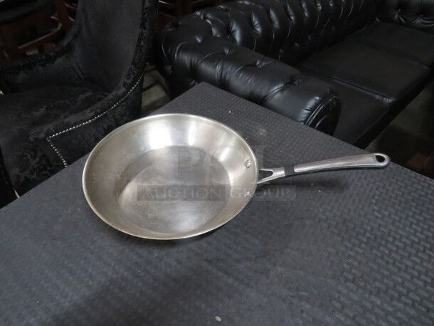 One Stainless Steel Calphalon 10 Inch Saute Pan. 
