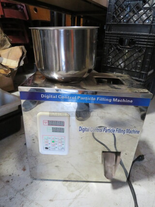 One Digital Control Particle Filling Machine. $330.00