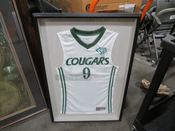One Framed Shadowbox With A Cougars Jersey. 24X2X36