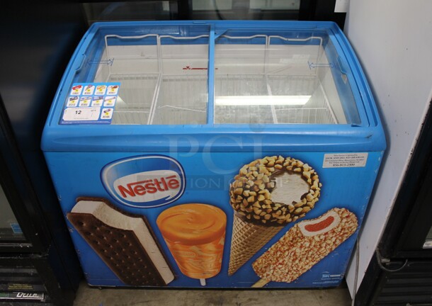 AHT RIO S 100 UL Metal Commercial Novelty Ice Cream Chest Freezer Merchandiser w/ 2 Sliding Lids and Poly Coated Baskets on Commercial Casters. 120 Volts, 1 Phase. Tested and Working!