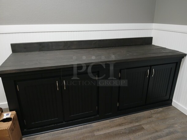 Black Built in Place Cabinet W/4 Doors. 
96"x33"x36"

**LABOR FOR REMOVAL ADDITIONAL FEE, CONTACT MISSOURI DIVISION FOR LABOR QUOTE OR ADDITIONAL QUESTIONS.