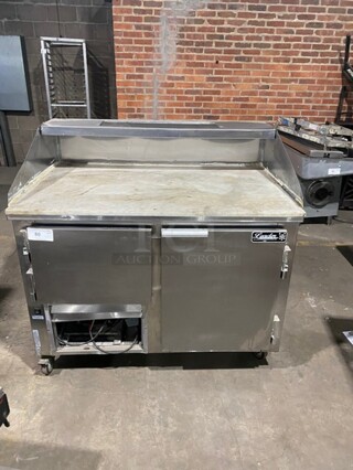 Leader Commercial Refrigerated Pizza Prep Table! With 2 Door Underneath Storage Space! All Stainless Steel! With Commercial Cutting Board! Model DR48SC Serial PT034266! 115V 1Phase! On Casters!