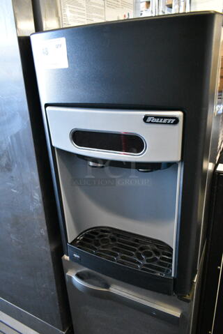 Follett 15CI100A 15 Series Air Cooled Countertop Ice Maker and Water Dispenser - 15 lb. Storage. 115 Volts, 1 Phase. 