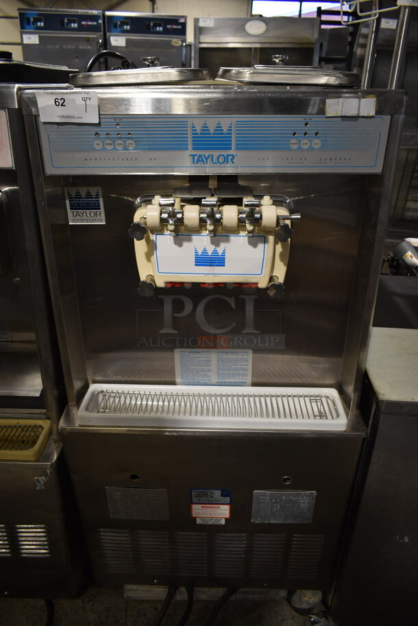 Taylor 754-33 Stainless Steel Commercial Floor Style 2 Flavor w/ Twist Soft Serve Ice Cream Machine on Commercial Casters. 208-230 Volts, 3 Phase. 