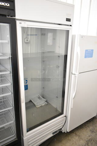 2021 True TSCI-600R-G-PH Metal Commercial Single Door Reach In Cooler Merchandiser w/ Poly Coated Racks. 115 Volts, 1 Phase.