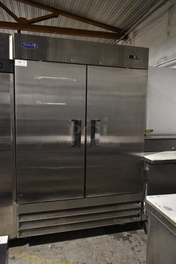 Grista GRFZ-2D Stainless Steel Commercial 2 Door Reach In Freezer w/ Poly Coated Racks on Commercial Casters. 115 Volts, 1 Phase. Tested and Working!
