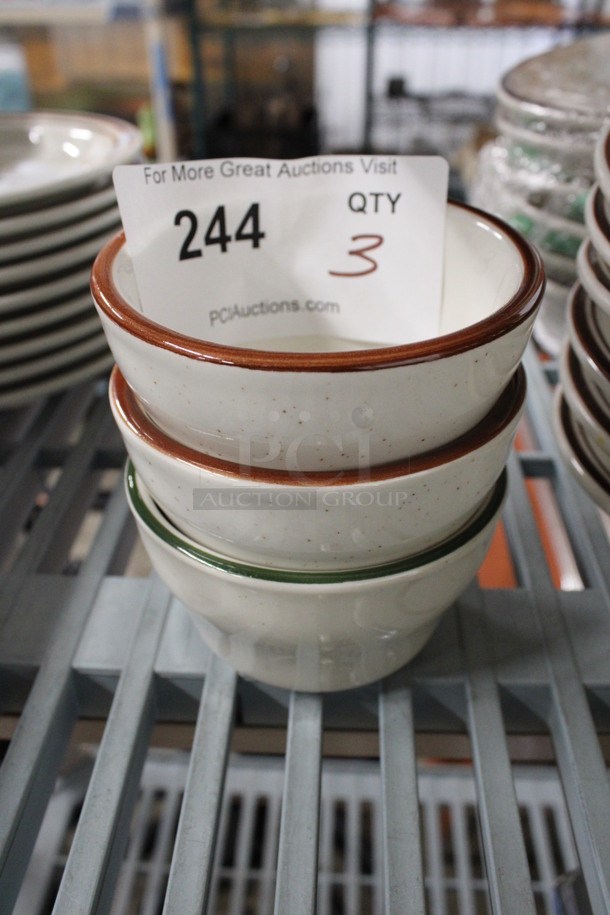 3 White Ceramic Bowls; 2 w/ Brown Rim and 1 w/ Green Rim. 4x4x2.5. 3 Times Your Bid!