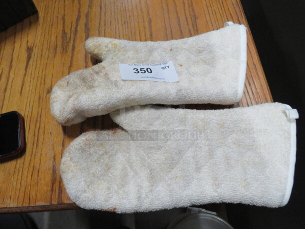 One Lot Of 2 Oven Mitts.