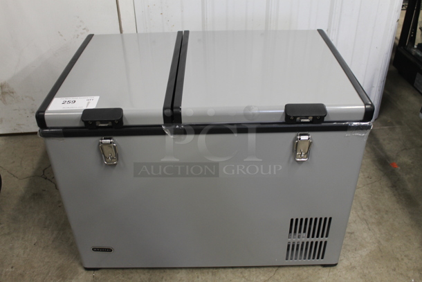 BRAND NEW SCRATCH AND DENT! Whynter FM-62DZ 62 Quart Dual Zone Portable Refrigerator and Deep Freezer Chest, AC 110V/ DC 12V, Real Freezer for Car, Home, and RV, -8°F to 50°F Temperature Range. 115 Volts, 1 Phase. Tested and Working!