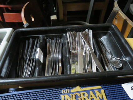 One Flatware Holder With Assorted Flatware.