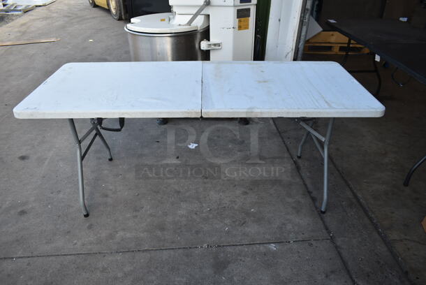 2 Folding Tables. 2 Times Your Bid!