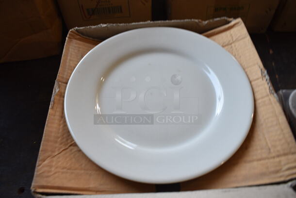 8 BRAND NEW IN BOX! White Ceramic Plates. 10.25x10.25x1. 8 Times Your Bid!