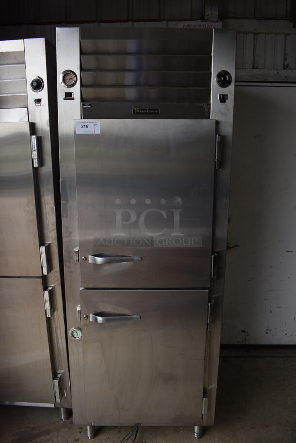 Traulsen Model RDH132WUT Stainless Steel Commercial 2 Half Size Door Reach In Warmer. 115 Volts, 1 Phase. 30x34x83. Tested and Working!