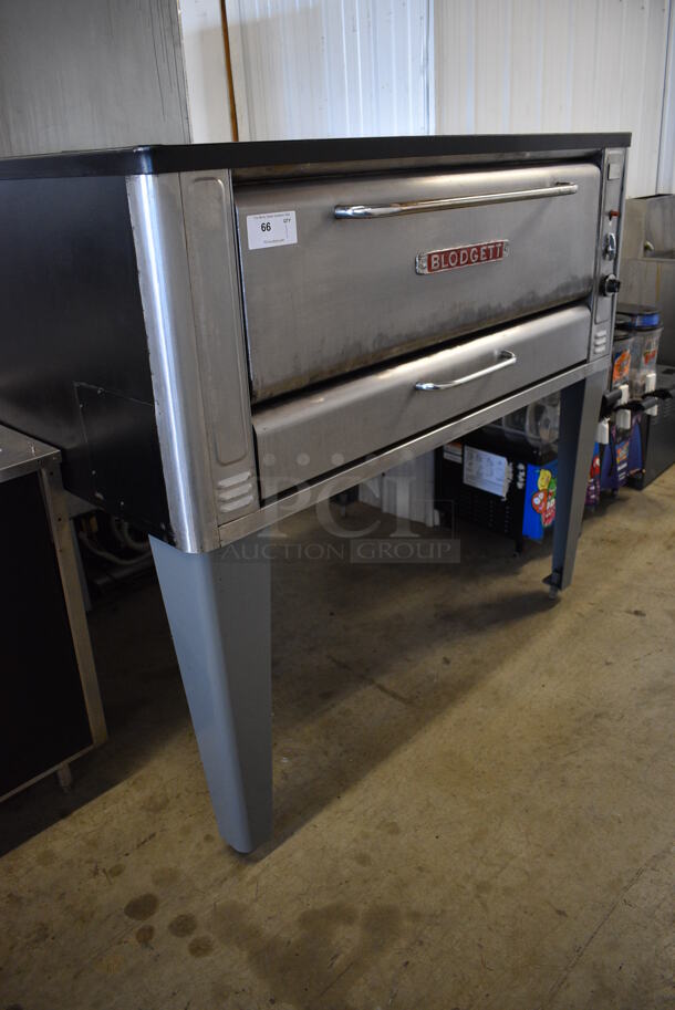 REFURBISHED! Blodgett 1048-C Stainless Steel Commercial Natural Gas Powered Single Deck Pizza Oven w/ Thermostatic Controls on Metal Legs. 60,000 BTU. 60.5x45.5x56
