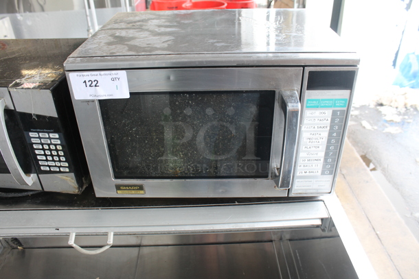 Sharp R-22FT Stainless Steel Countertop Microwave Oven. 120 Volts, 1 Phase. 