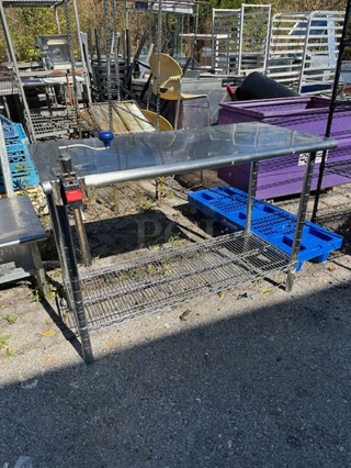 One Stainless Steel Table With A Metro Undershelf And A 10lb Can Opener. 49.5X24X35